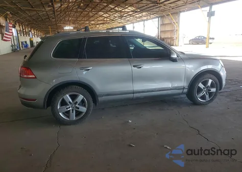 2011 Volkswagen Touareg Hybrid from USA, damaged, VIN WVGFG9BP5BD001253